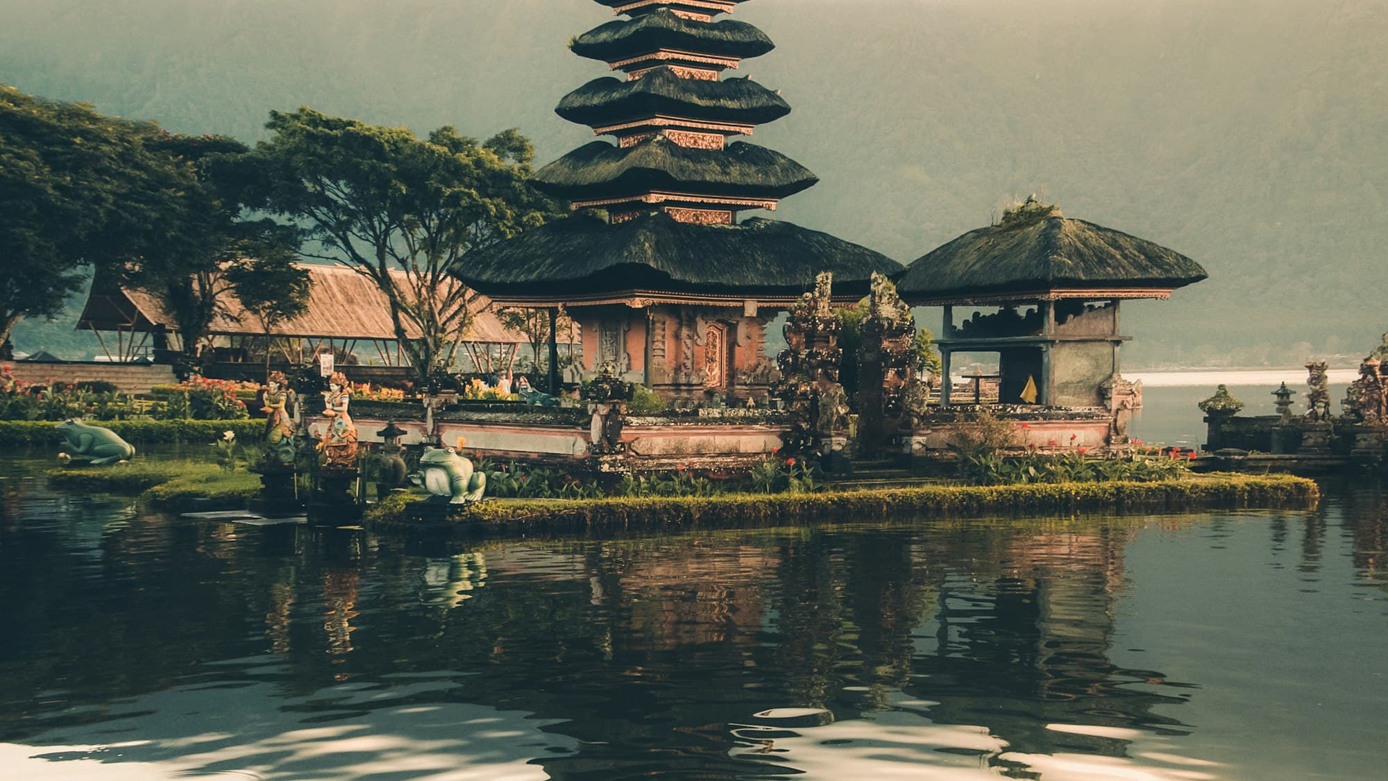 Ulun Danu Beratan temple reflected in a still lake in Bali