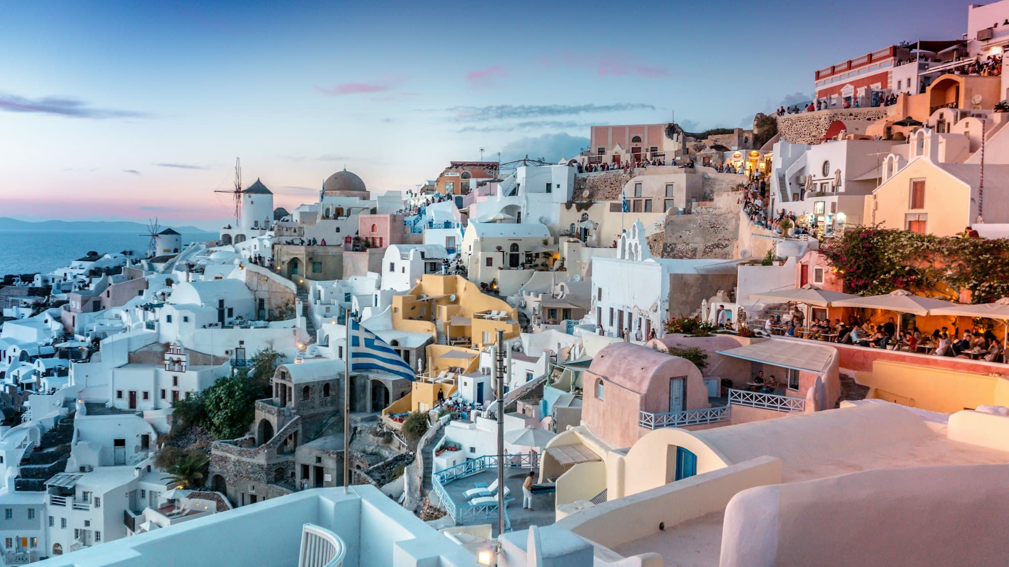 Whitewashed houses of Oia, Santorini, at dusk